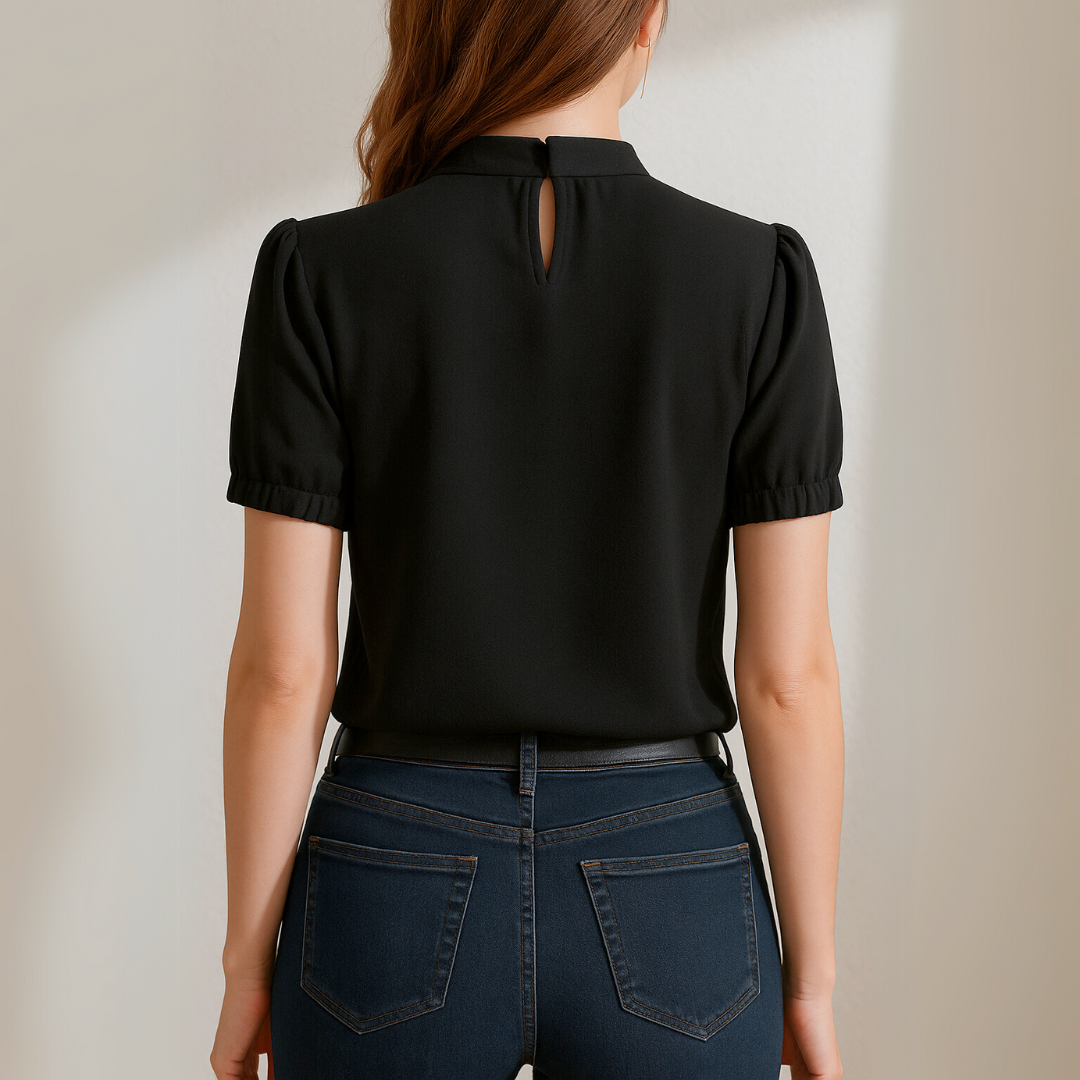 Inge | Blusa negra plisada con mangas abiertas